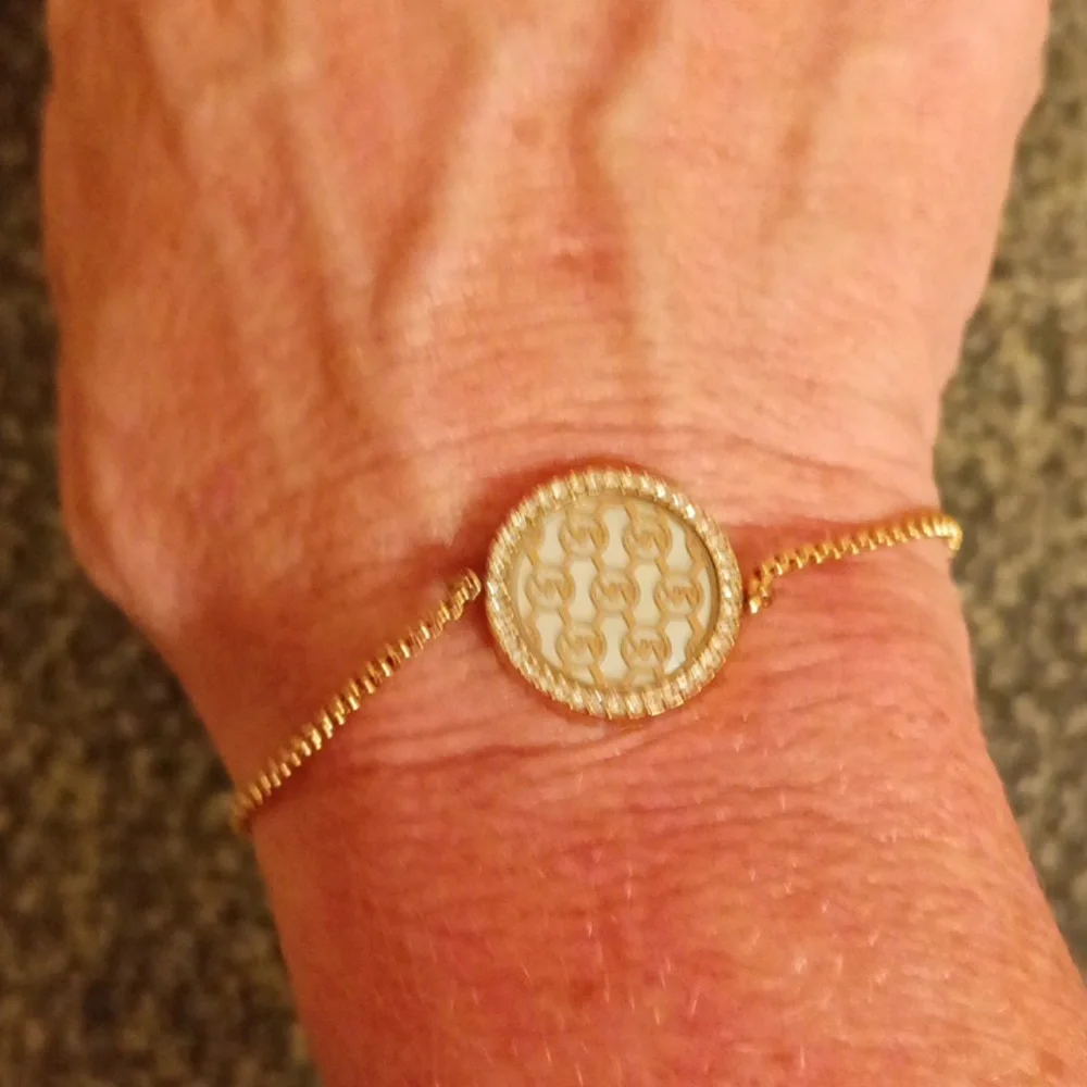 Michael Kors rose gold rhinestone zip bracelet